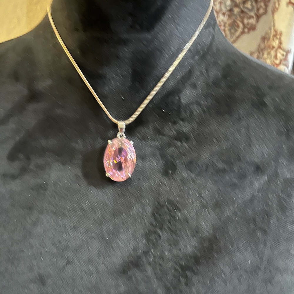 Beautiful Pink stone set in 18 KGelectroplate with Italian sterling silver. 16”